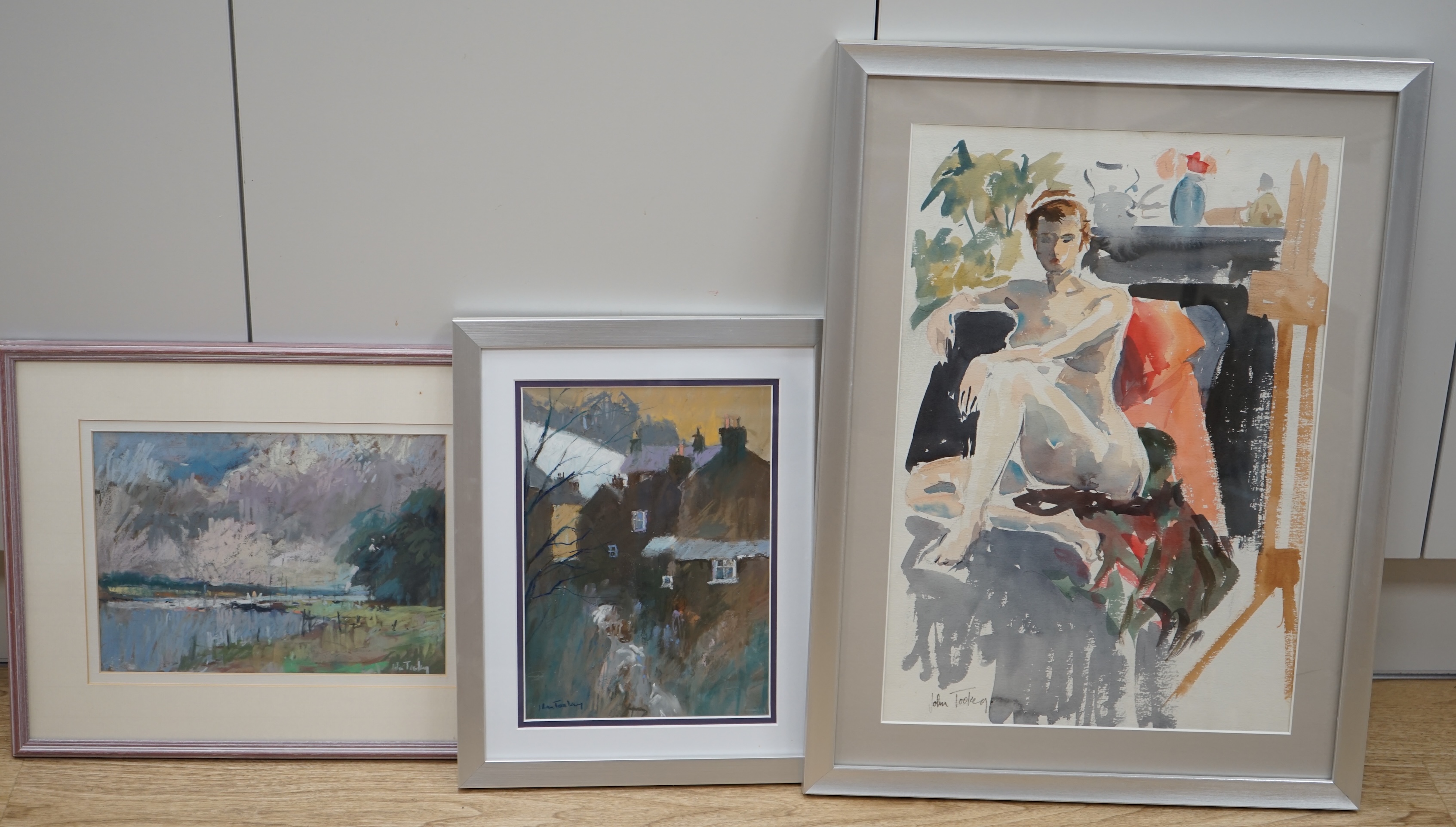 John Tookey (b.1947), two pastels, Landscapes, and a watercolour, Nude woman, each signed, 49 x 34cm. Condition - fair to good